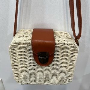 Basket purse, small white in color. No brand that i can see